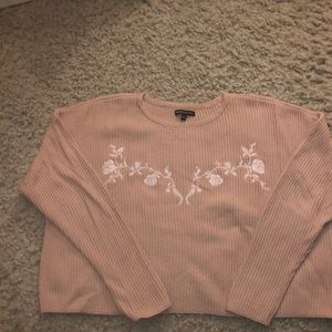 Pink sweater with white roses embroidery